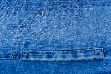 Blue denim jean  with pocket fabric texture for backgroundの写真素材