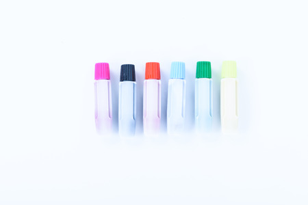 art white plastic pcolor tube on white backgroundの写真素材