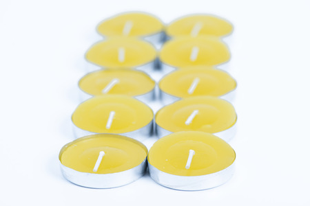 orange aromatherapy candles smell on white backgroundの写真素材