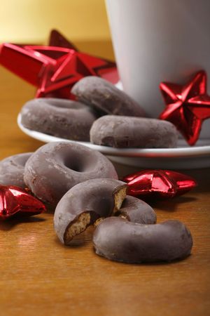 milk and cookies for santa on table with gold backgroundの写真素材