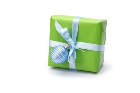green present box with blue ribbon isolated on white backgroundの写真素材