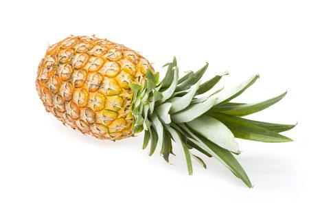 fresh pineapple fruits with green leaf isolated on white background の写真素材