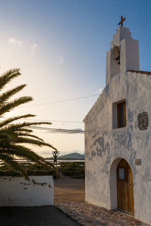 A traditional Spanish church in the evening sunの写真素材