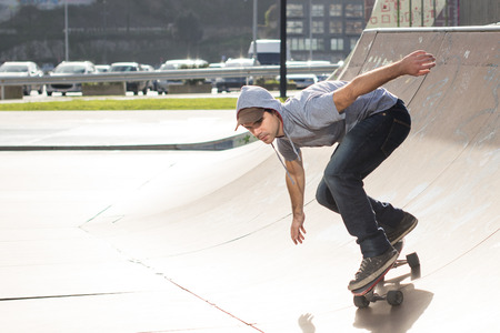 Skateboarder in action in the skate park.の写真素材
