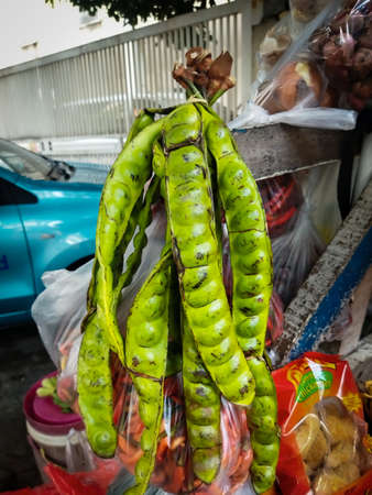 Fresh peteh below from the market and sold by mobile traders in Jakarta, Indonesiaの写真素材