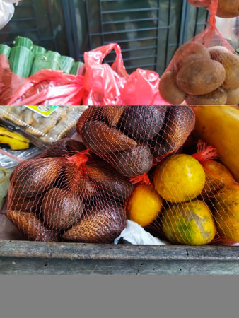Fresh salak fruit, delicious when eaten directly, the fruit is below from the market and sold by peddlers in Jakarta, Indonesiaの写真素材