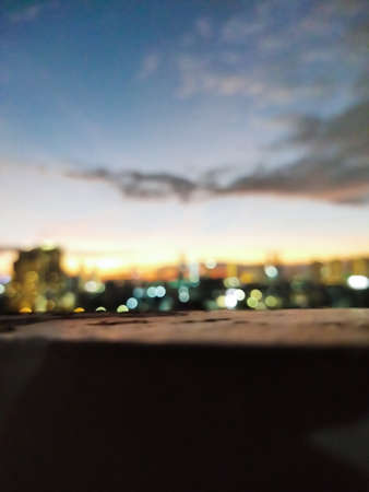 A beautiful sunrise in the city makes the afternoon feel very warm and makes the sky look stunningの写真素材