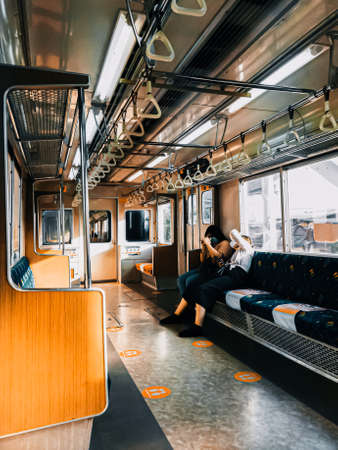 Jakarta, Indonesia - February 13th, 2021: Trains in Jakarta, Indonesia that is not too many passengers, a result of Covid 19.のeditorial素材