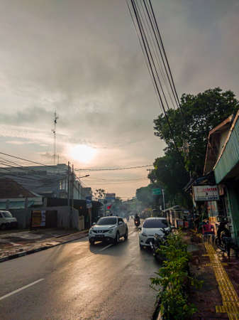 Jakarta Pusat, Indonesia, February 16th, 2021: beautiful sunset on the highway through the vehicleのeditorial素材