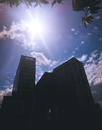 The building under the hot sun, and under the pretty blue skyの写真素材