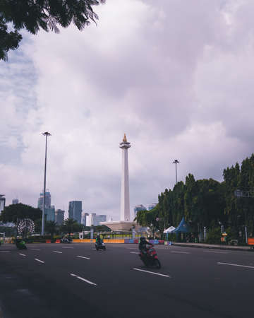 Central Jakarta, Indonesia - January 12th, 2021: Monas is one of the most famous prima donnas in Jakarta, Indonesia, especially when viewed from across the streetのeditorial素材