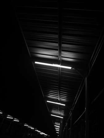 Lights at the train station at night in Jakarta, Indonesiaの写真素材