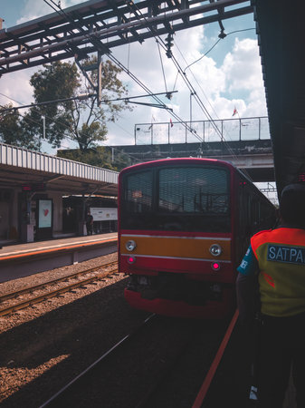Central Jakarta, Indonesia - April 1th, 2021: Indonesian trains are waiting for passengers to leave for the next stationのeditorial素材