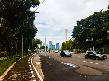 Central Jakarta, Indonesia - April 5th, 2021: Medan Merdeka Utara Street is a road that is close to the Indonesian National Monument or Monas in the city of Central Jakarta.のeditorial素材