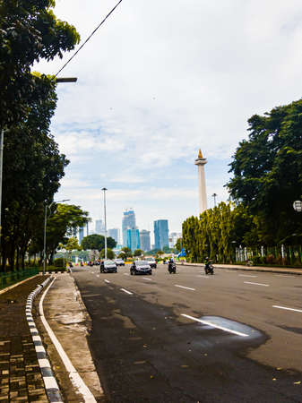 Central Jakarta, Indonesia - April 5th, 2021: Medan Merdeka Utara Street is a road that is close to the Indonesian National Monument or Monas in the city of Central Jakarta.のeditorial素材