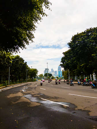 Central Jakarta, Indonesia - April 5th, 2021: Medan Merdeka Utara Street is a road that is close to the Indonesian National Monument or Monas in the city of Central Jakarta.のeditorial素材