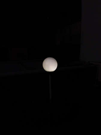 White light bulb illuminates the gardenの写真素材