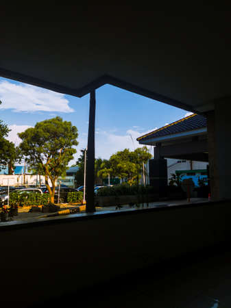 Central Jakarta, Indonesia - April 12th, 2021: The beautiful blue sky adorns the sky above the building.のeditorial素材