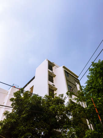Boarding house that has a height of approximately seven to ten floorsの写真素材