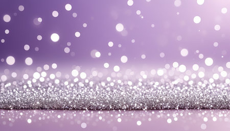 Sparkling silver glitter and bokeh lights on purple background.の素材