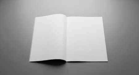 Blank open book on gray background ready for design mockup and creativity projects.の素材