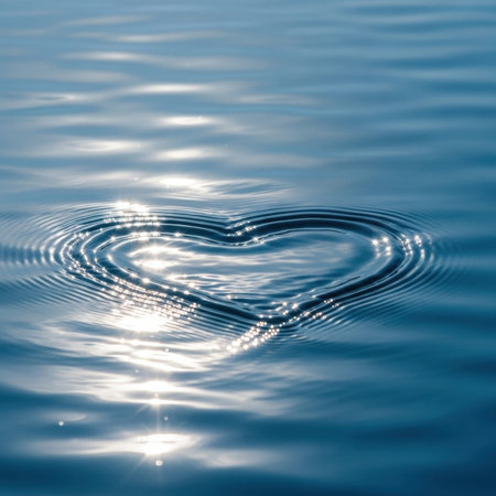 Rippling heart on water reflecting sunlight for valentine's day romance design.の素材