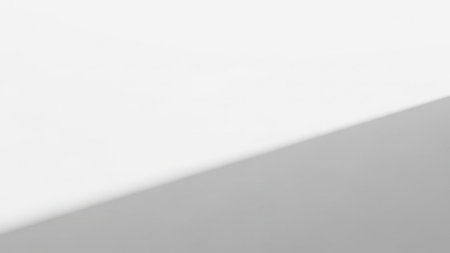 A sleek and modern gradient background transitioning from white to light gray, perfect for various design projects.の素材