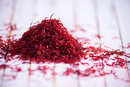 close-up of Pile of red Saffron on rustic background.の写真素材