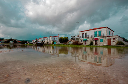 Turkey -Izmir -15 January 2021 AlaÃ§atÄ± street photos, reflections in rainwater.のeditorial素材