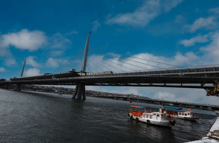 (Istanbul - Turkey 16.February.2021) It is a stretched inclined suspension bridge located on the estuary in Istanbul that enables the passage of the M2 metro line.のeditorial素材