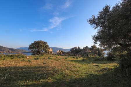 rock tombs , latmos ancient city - KapÄ±kÄ±rÄ± village - Lake Bafaの写真素材