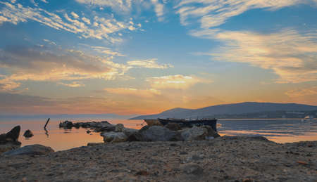 Dikili -Izmir - Turkey 15.August 2021 Boats on the sea in Bademli neighborhood at sunsetのeditorial素材