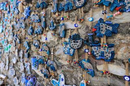 Colorful evil eye beads sold in the bazaar in old datca, wall decorationsの写真素材