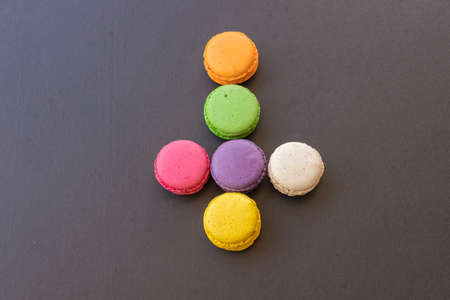 Cake macaron or macaroon on black background, colorful macaroons .Colorful macaron cakes .の写真素材