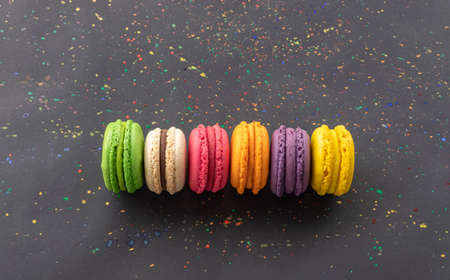 Sweet colorful macarons isolated on black background. Delicious colorful macaroons. high quality photoの写真素材