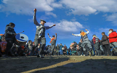 Selcuk, Turkey - January 16, 2022 : Turkish Efes are dancing in Selcuk Arena during camel wrestling.Camel wrestling is popular attraction in Aegean part of Turkey.のeditorial素材