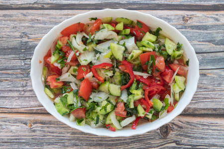 Turkish Shepards Salad with cucumber, tomato, red onion, pepper, parsley (Turkish name; zucchini salad)の写真素材