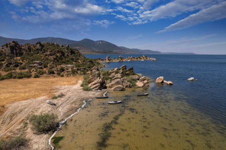 Lake Bafa is a lake and a nature reserve situated in southwestern. At the innermost north-east tip of the lake is the village of Kapikiri, as well as the ruins of Heraclea by Latmuの写真素材