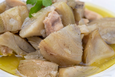 Olive oil artichoke dish cooked with lamb meatの写真素材