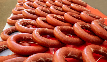 Turkish sausage coil sausage. Sujuk (sausage) is a dry spicy sausage at the market.