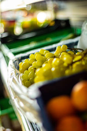 Some fresh grapes waiting to be eaten.の写真素材