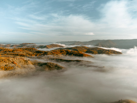 Morning landscape photo with fog like ocean.の写真素材