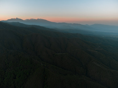 Aerial view of mountains and forest at sunset. Beautiful natural landscapeの写真素材