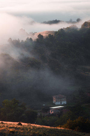 Morning fog in Banicha, Bulgaria. Rural landscape.