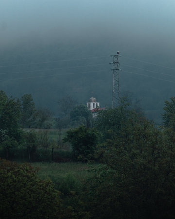 A top of a church on a top of a hill.の写真素材