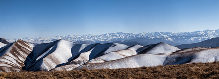 The Caucasus mountain range, photo taken from the top of the Gimrinskogo mountain range. Dagestan 2015. The highest point, the peak. in the background is seen the main Caucasian ridge. Panoramaの写真素材