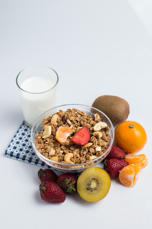 Granola white fruits on the white background.の写真素材