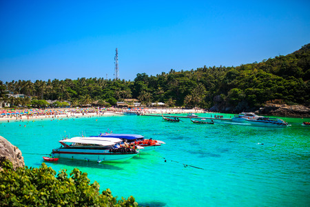 Landscape of many boats floating on the deep blue sea in summer.の写真素材