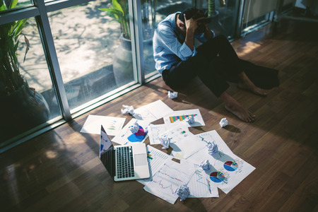 Business asian man stress and sad business failure concept. failure idea concept.の写真素材