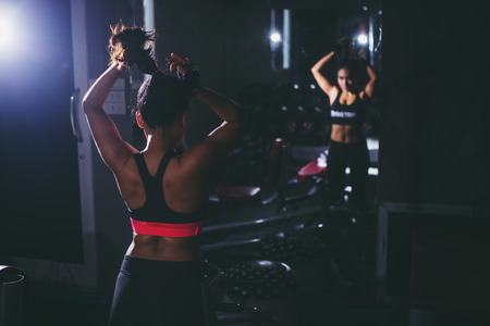 Asia strong women doing preparations for exercise in the gym.の写真素材